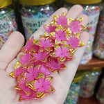 Matte acrylic flower beads with gold borders