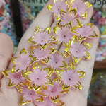 Matte acrylic flower beads with gold borders