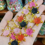 Matte acrylic flower beads with gold borders
