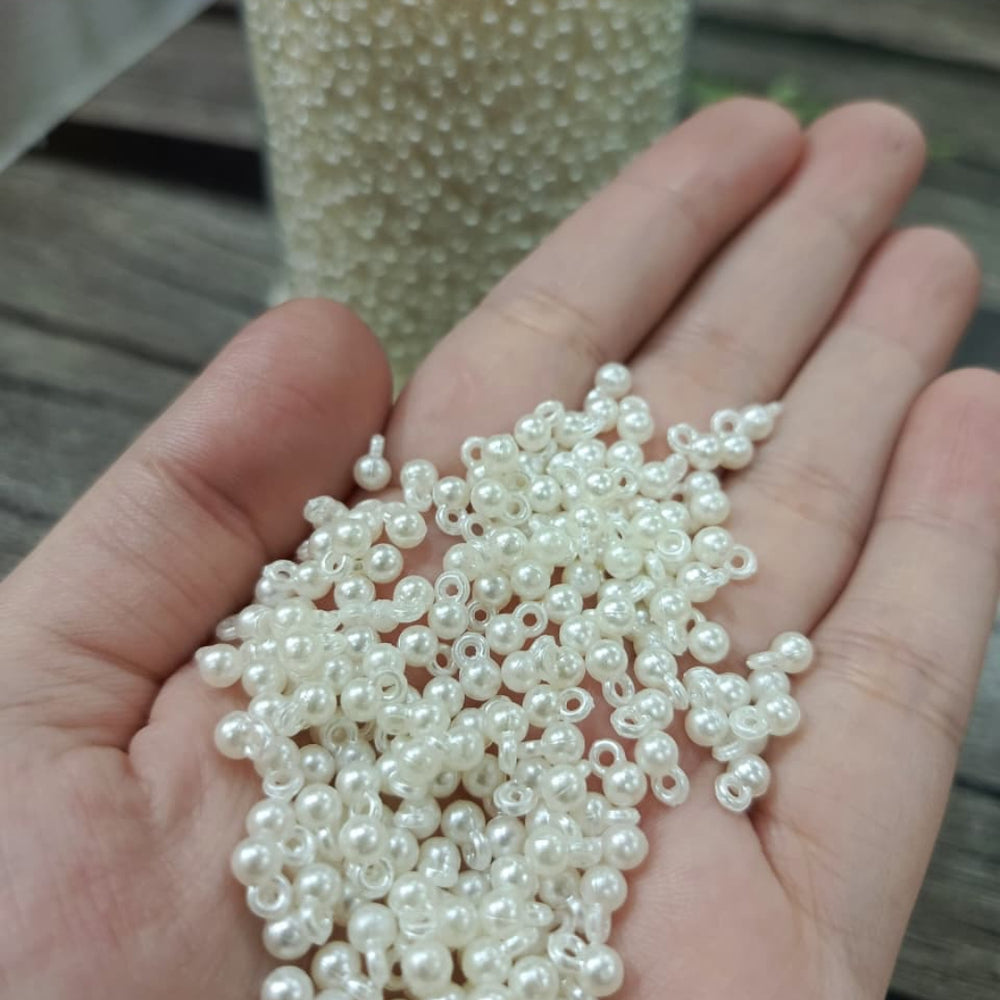White Loreal beads