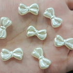 White bow beads