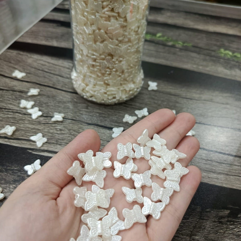 White butterfly beads