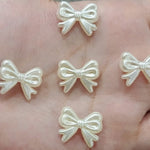 White bow beads