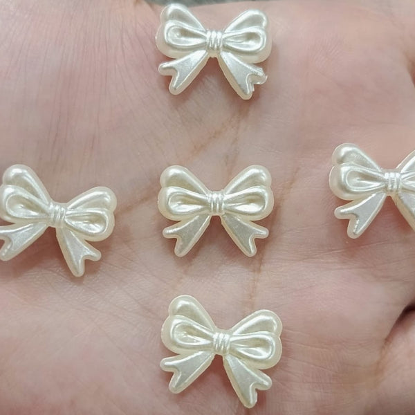 White bow beads