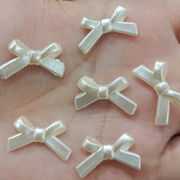 White bow beads